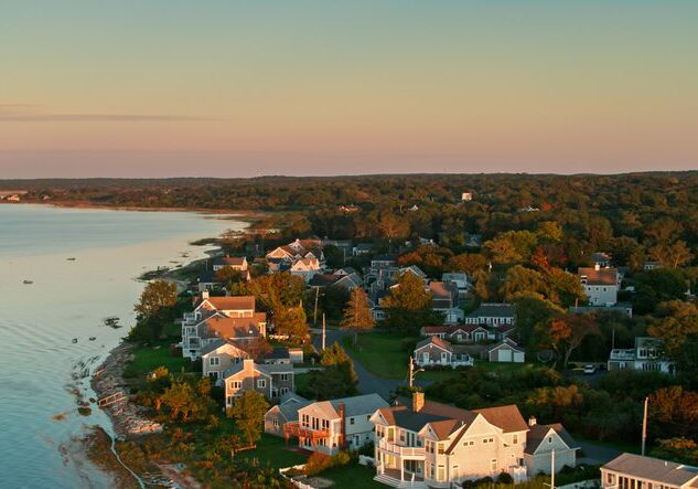 Drone shot of Cape Cod Bay at sunset on a sunny day in Fall, close to the town of Barnstable. 

Authorization was obtained from the FAA for this operation in restricted airspace.